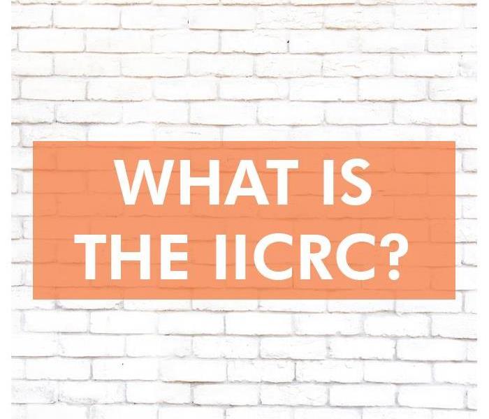 Question: What is the IICRC on a background of a white brick wall